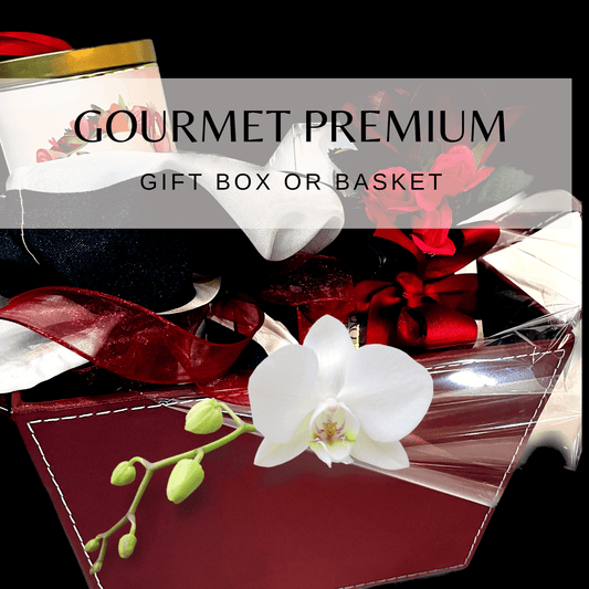 Gourmet premium gift basket featuring delectable treats and elegant floral accents, perfect for any special occasion.