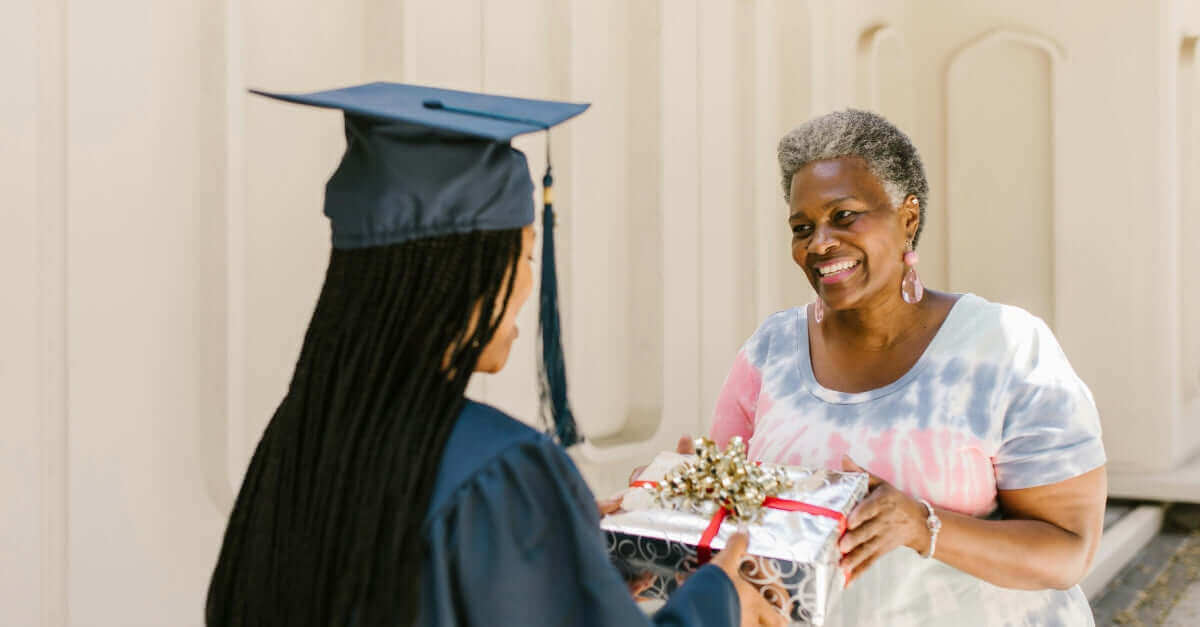 BLOG: An older woman giving a present to a young woman