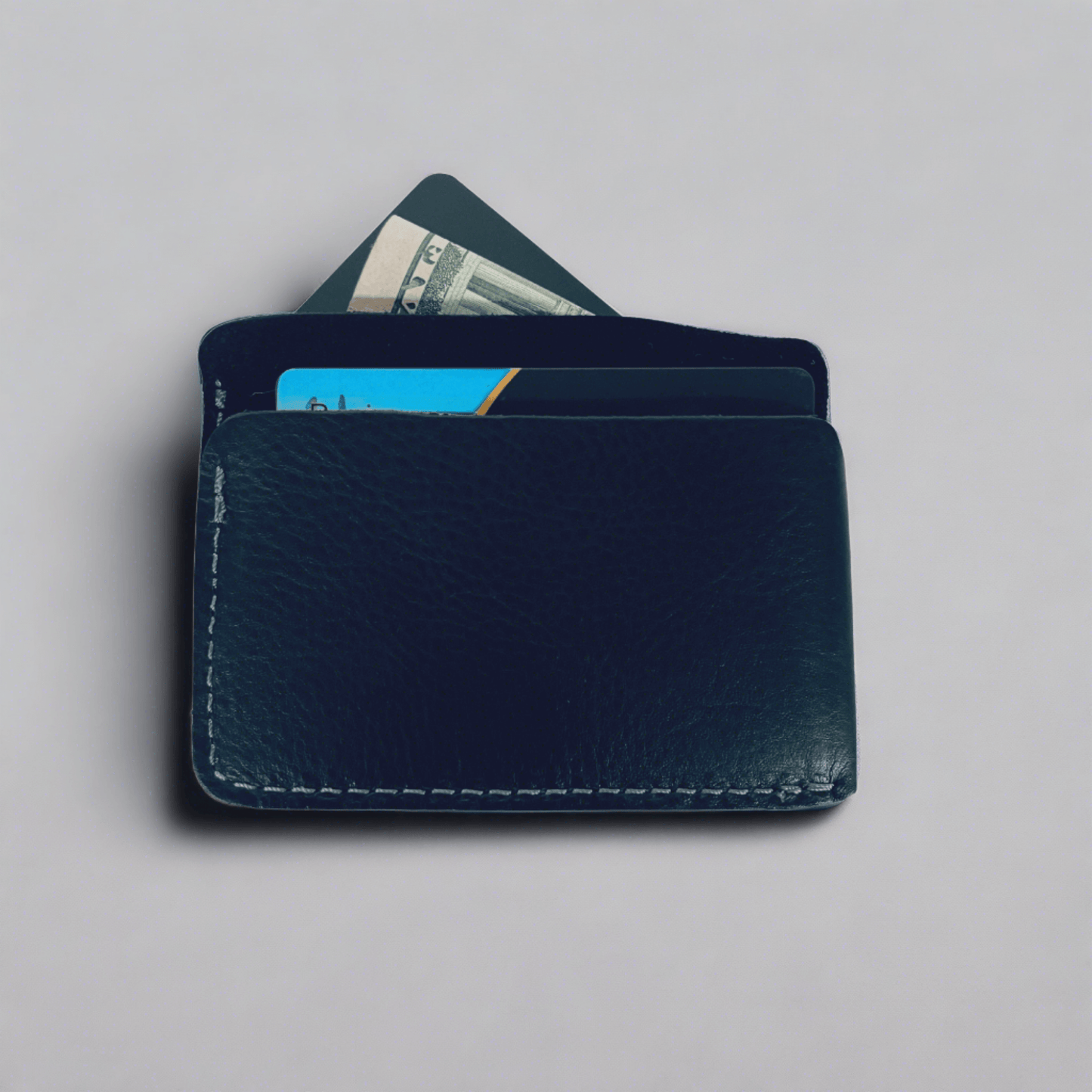 Compact leather wallet with triple card pockets for convenient organization.