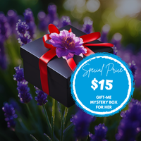 Thumbnail for Black gift box with red ribbon and purple flower surrounded by lavender flowers, featuring a special price tag.