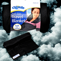 Thumbnail for Black travel blanket with Cloudz packaging on a cloud background
