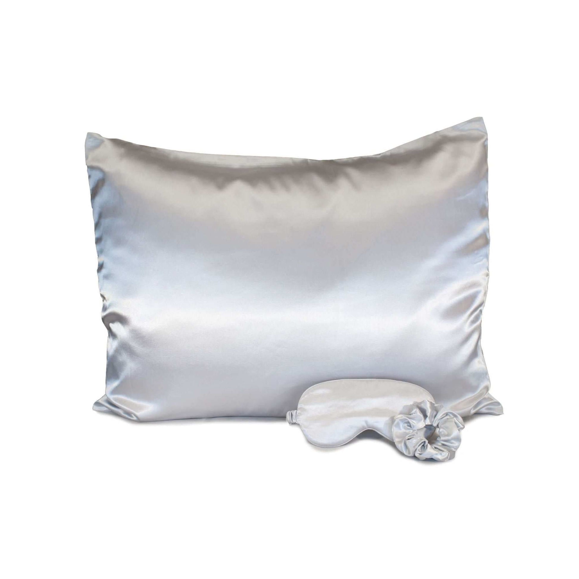 Elegant satin sleep set with soft pillow and sleep mask, perfect for a restful night's sleep.