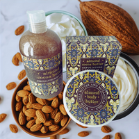 Thumbnail for Almond and cocoa butter products including a bottle, box, and body butter on a white background with almonds and a coconut.