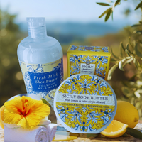 Thumbnail for Sicily-themed skincare products with lemons and a yellow flower on a blurred natural background