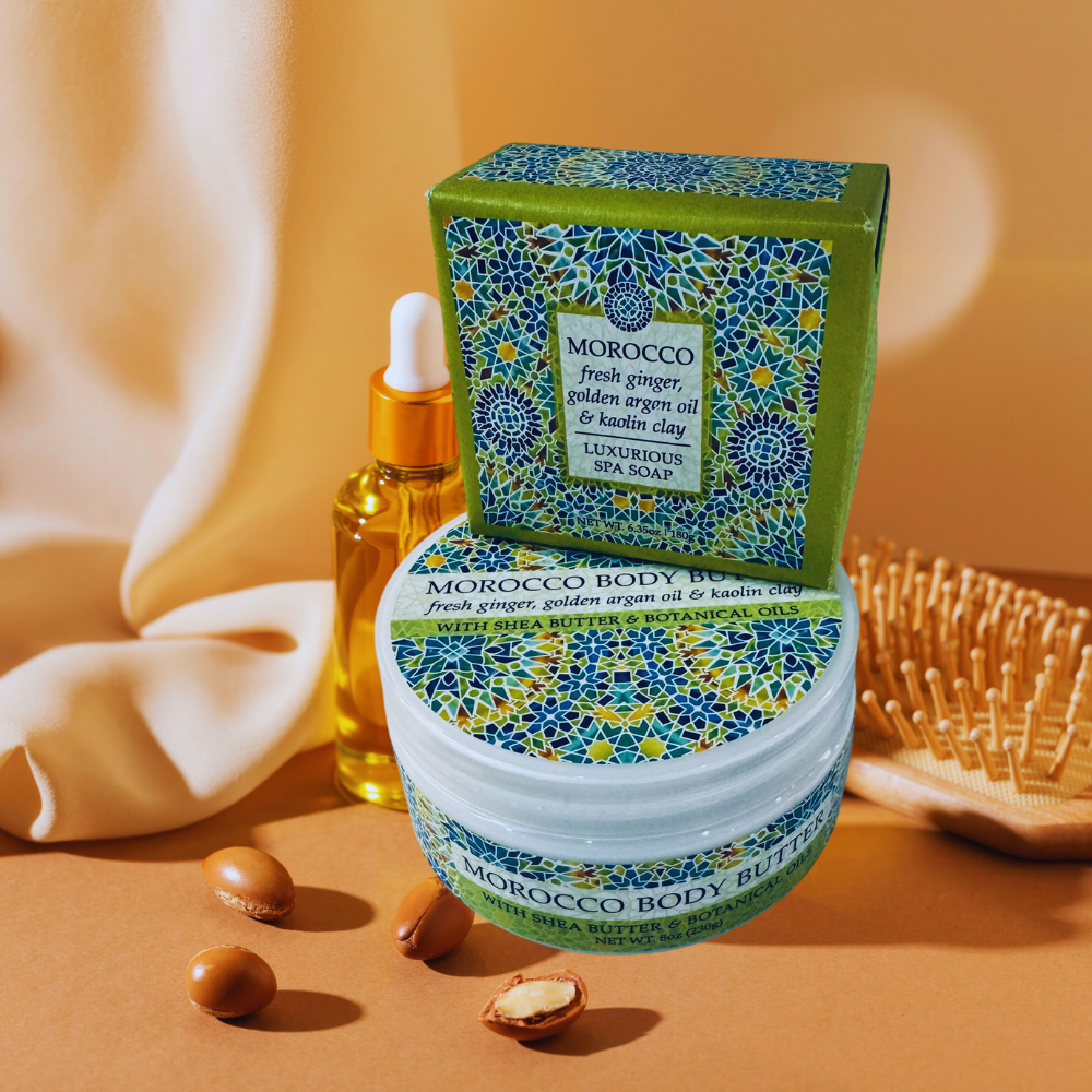 Moroccan skincare products including soap, body butter, and oil on a warm background
