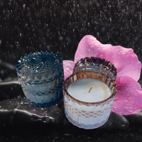 Thumbnail for Candles in Intricate Glass Vessels