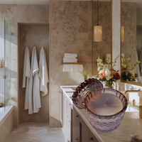 Thumbnail for Bathroom interior with towels, candles, and flowers.