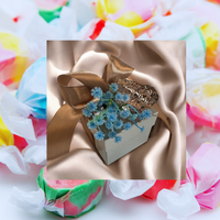 Thumbnail for Decorative tin candy box with taffy candies