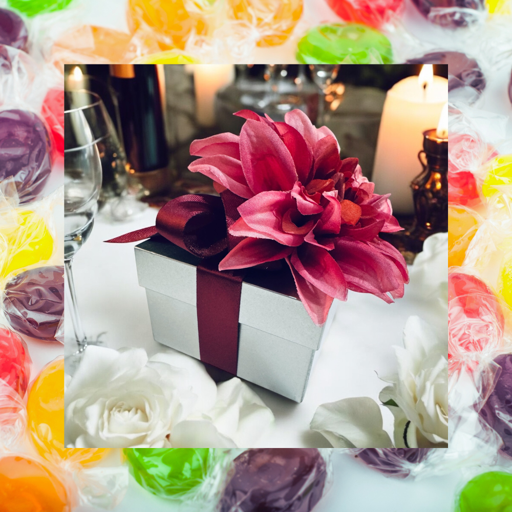 Decorative tin with fruit candies with floral wrapping