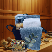 Thumbnail for Grey towels and soap on a wooden surface with a wooden panel background