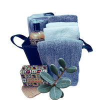 Thumbnail for Bath products including towels, soap, and a bottle on a white background