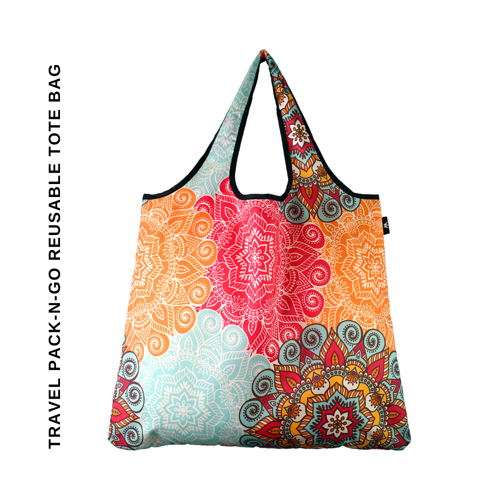 A reusable tote bag with a colorful mandala pattern in orange, pink, teal, and red, featuring black trim and handles, shown on a white background with vertical text on the left.