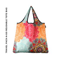 Thumbnail for A reusable tote bag with a colorful mandala pattern in orange, pink, teal, and red, featuring black trim and handles, shown on a white background with vertical text on the left.