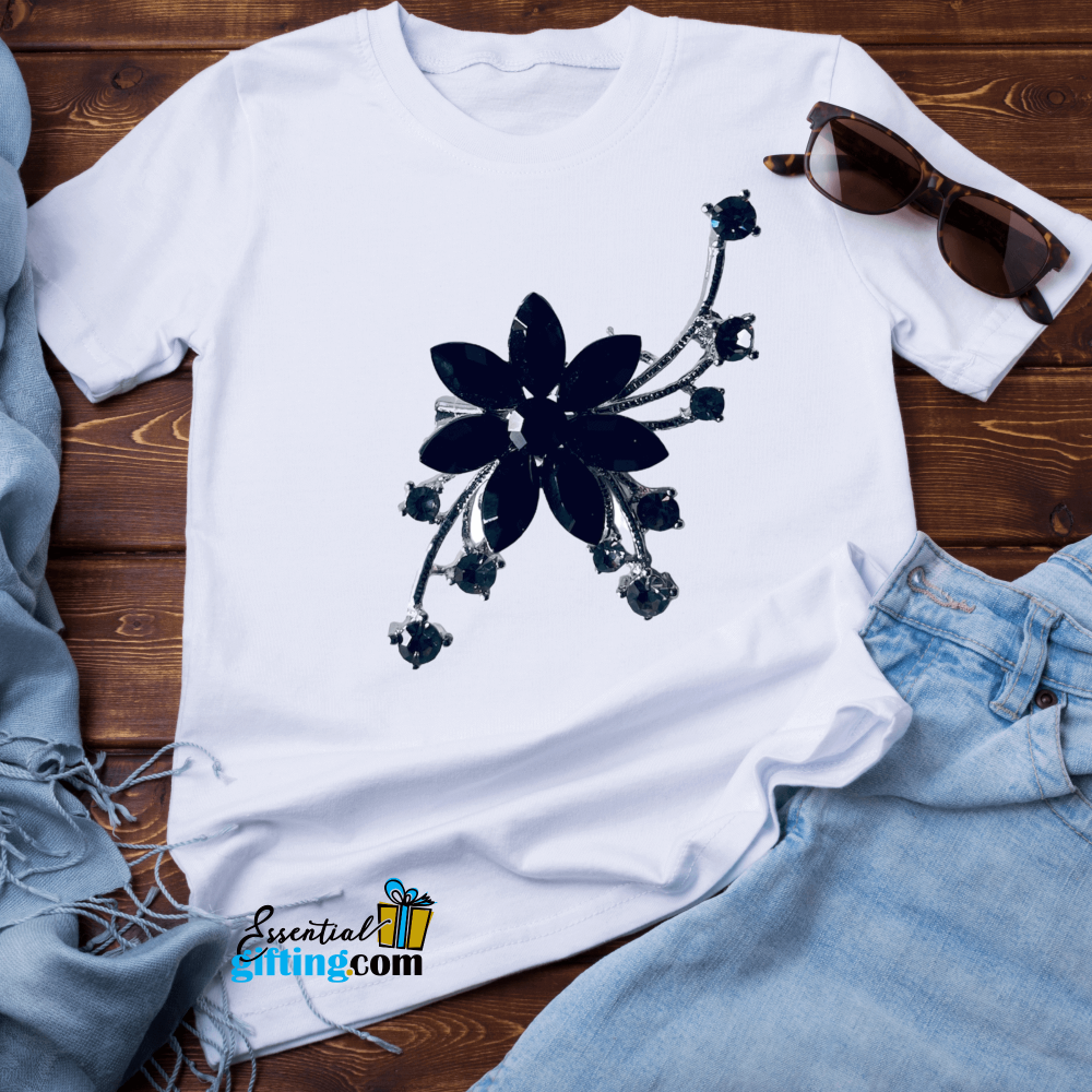 Elegant Floral Brooch Pin: Striking Monochrome Design on White T-shirt