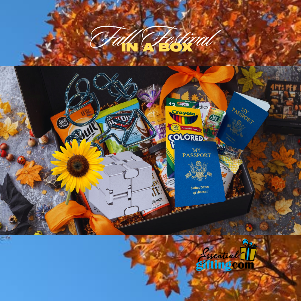 Gift box with stationery items and a passport, surrounded by autumn leaves.
