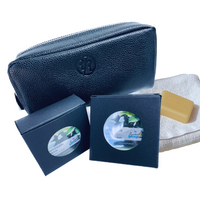 Thumbnail for Black leather pouch with two soap boxes and a bar of soap on a white background