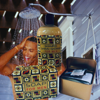 Thumbnail for Shampoo, soap, and shaving products for men with a person showering in the background.