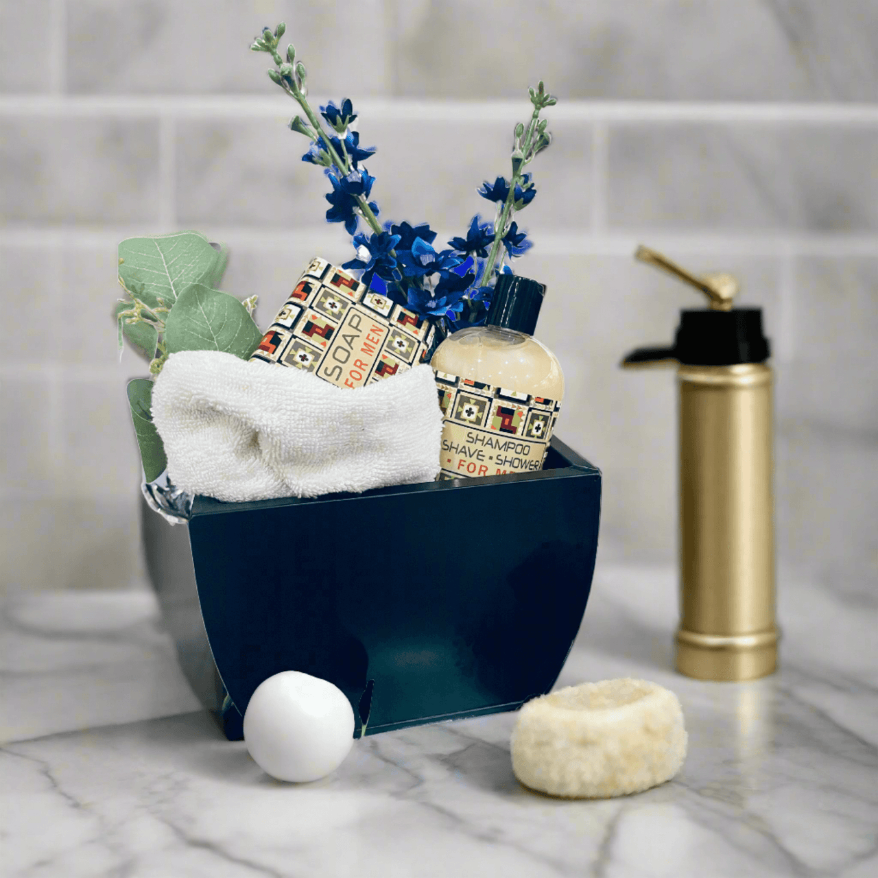 Stylish personal care essentials: navy storage bin, plush towel, dried flowers, and grooming tools - a thoughtful Mens Shower Vase gift set from Essentialgifting.