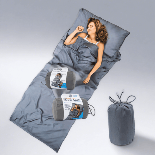 Compact gray sleep sack with storage pouch, ideal for comfortable travel.