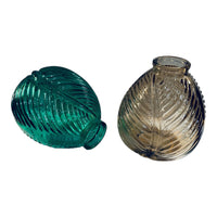 Thumbnail for Two glass vases, one green and one brown, on a white background