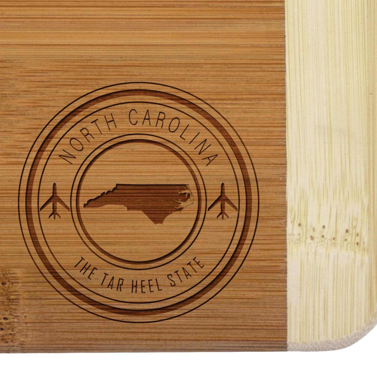 Rustic North Carolina Souvenir Mini Bar Board Set - Wooden cutting board with engraved North Carolina state shape and motto.