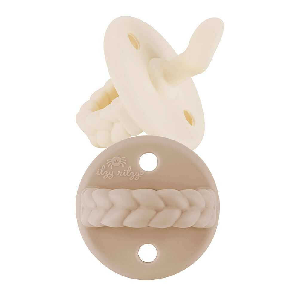 Cozy pacifier with braided design, a versatile baby travel gift set.