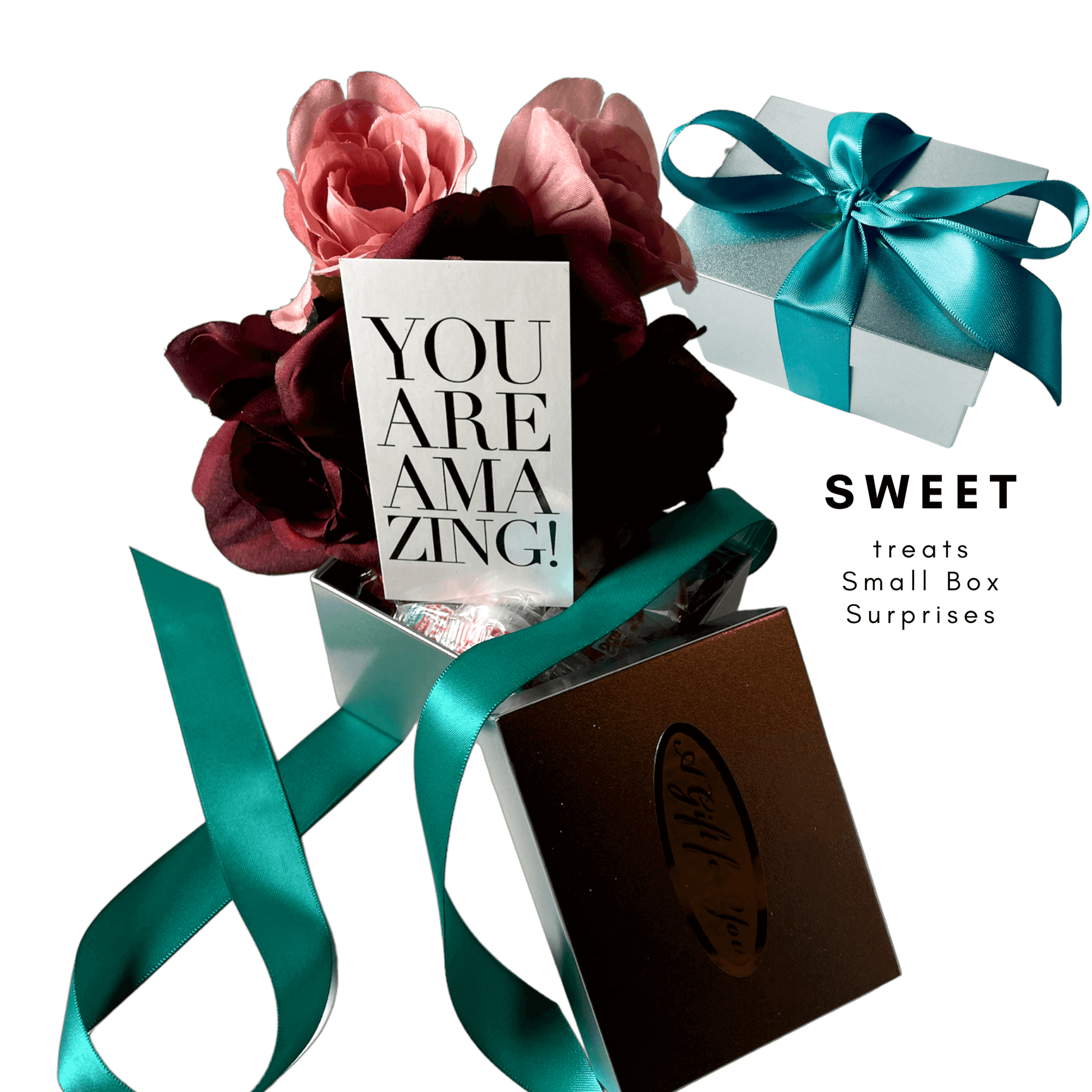 Charming candy box set with delicate flowers, ribbon, and a decorative "You are amazing!" label, offering sweet treats and small surprises.