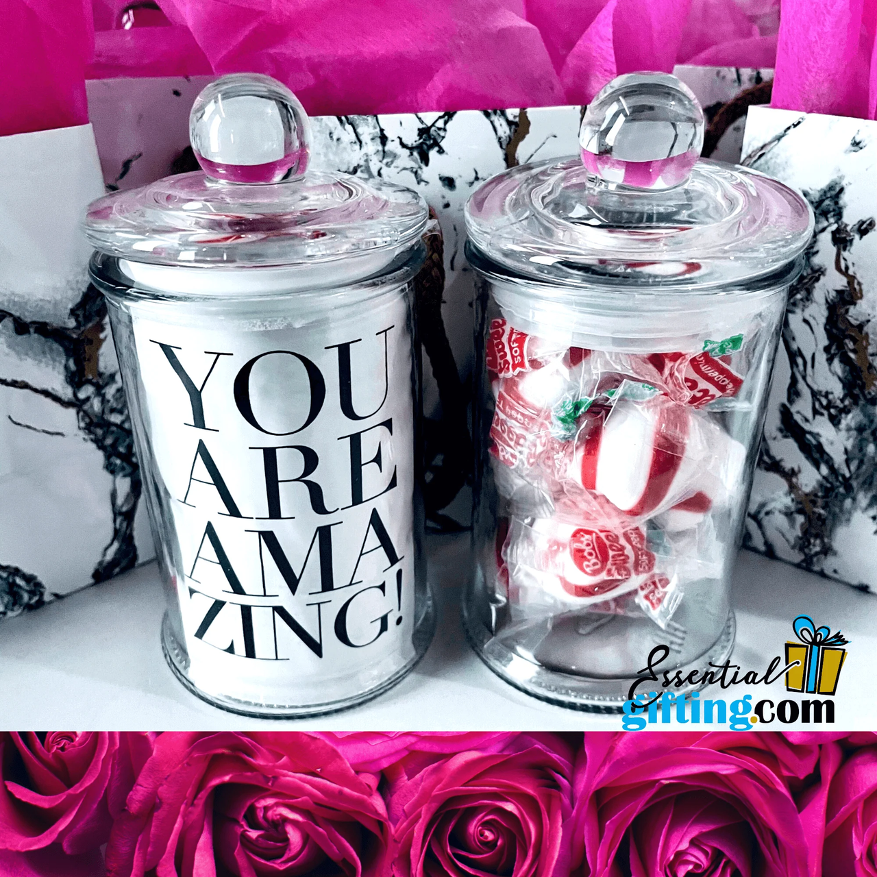 Peppermint candy in elegant glass jars against pink rose backdrop, showcasing the "You Are Amazing" gift message - a thoughtful lifestyle product from Essentialgifting.